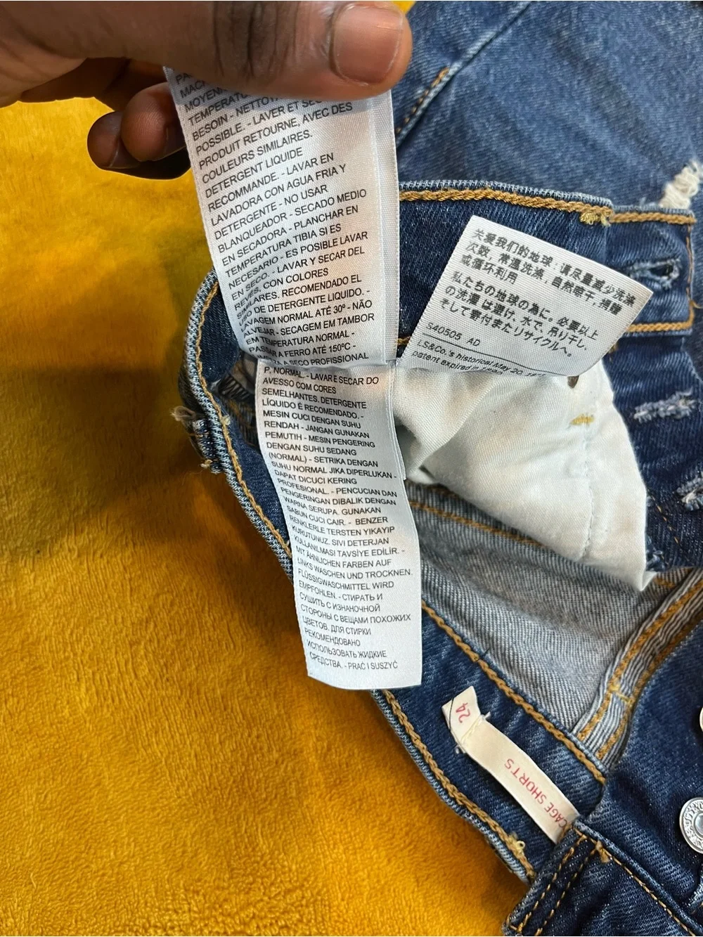 Levi’s High-Rise Distressed Denim Shorts — Blue